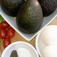 Baked eggs in Avocado: two all-star ingredients for your summer Atkins compliant meals.! Low carbs, high flavor. Gluten Free and Dairy Free. Perfect for brunch or breakfast.