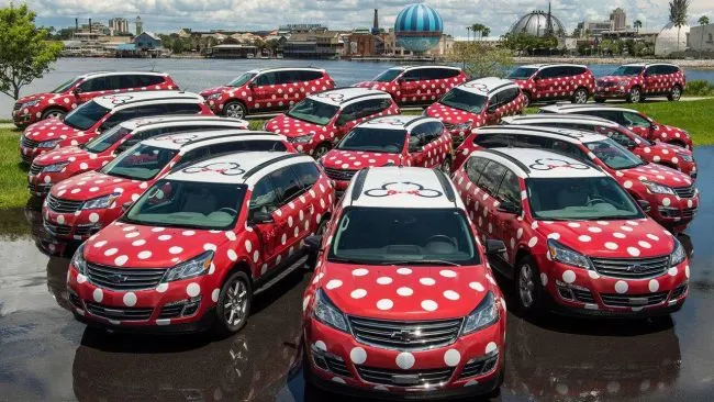 The Minnie Van fleet are ready to take you to MCO via Lyft Orlando