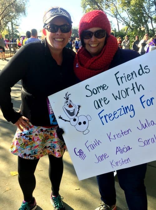 race sign during the rundisney marathon some friends are worth freezing for