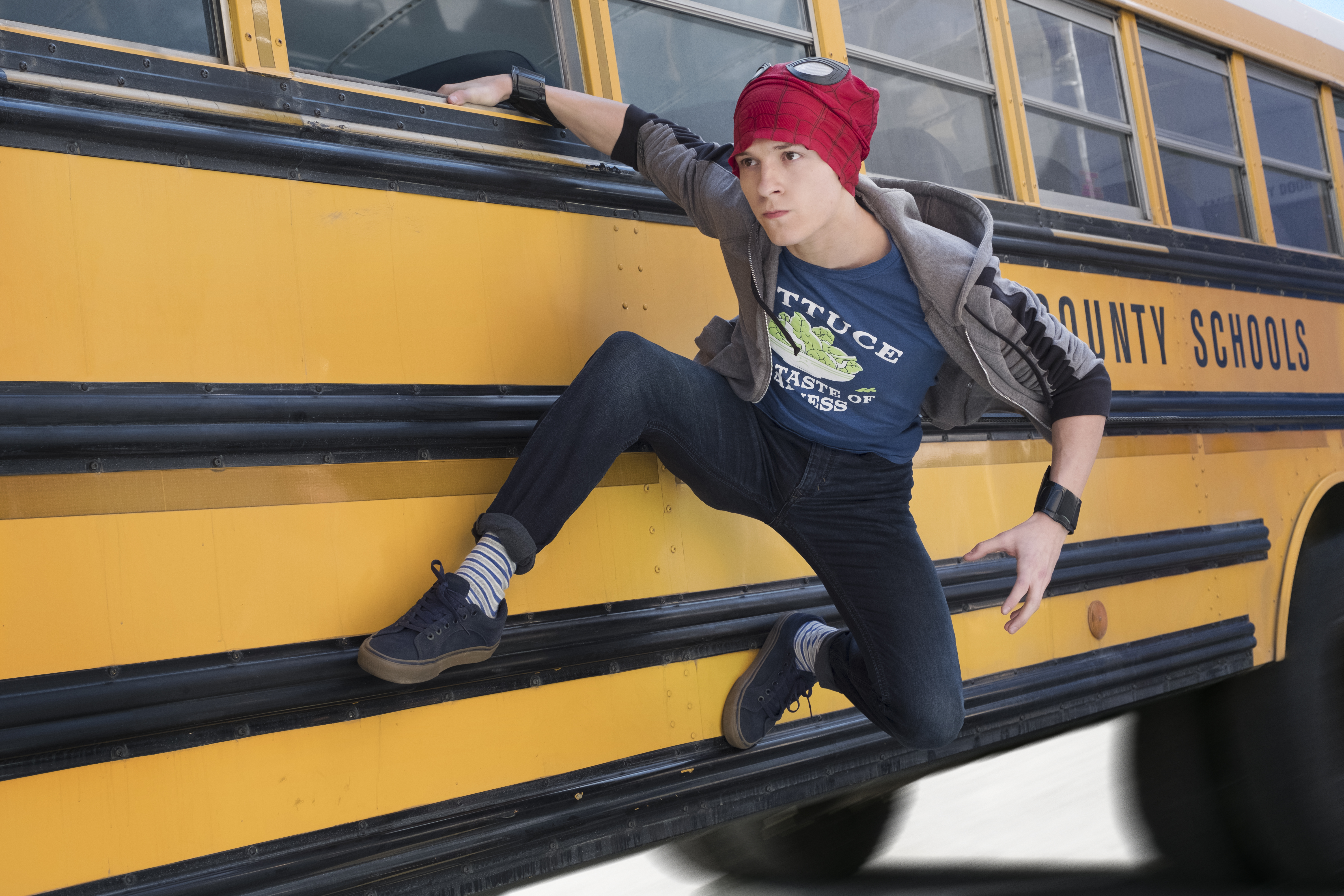 Avengers Infinity War Spider Man on side of school bus