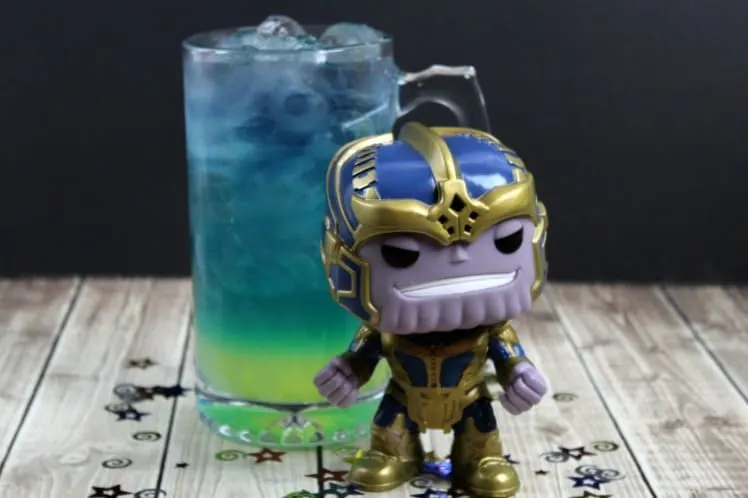 Thanos Avengers Marvel cocktail layered drink with Thanos Pop Funko