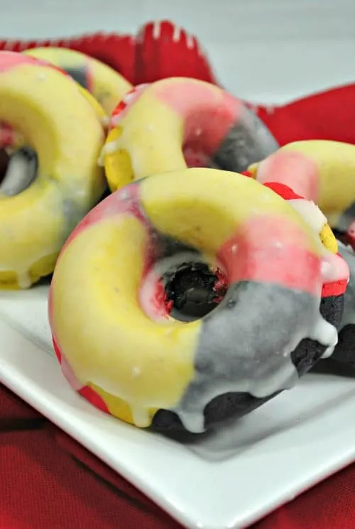 The Incredibles Donuts Recipe final product red yellow and black glazed donuts