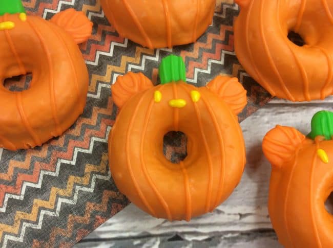 Mickey shaped orange pumpkin donuts