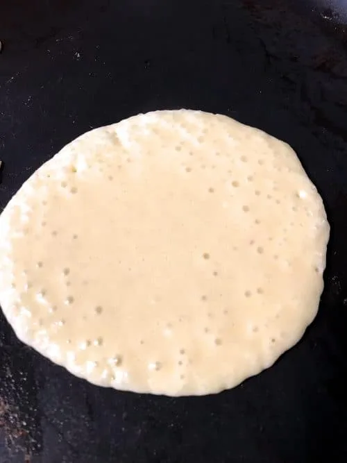 Almond Keto Pancakes in process on griddle
