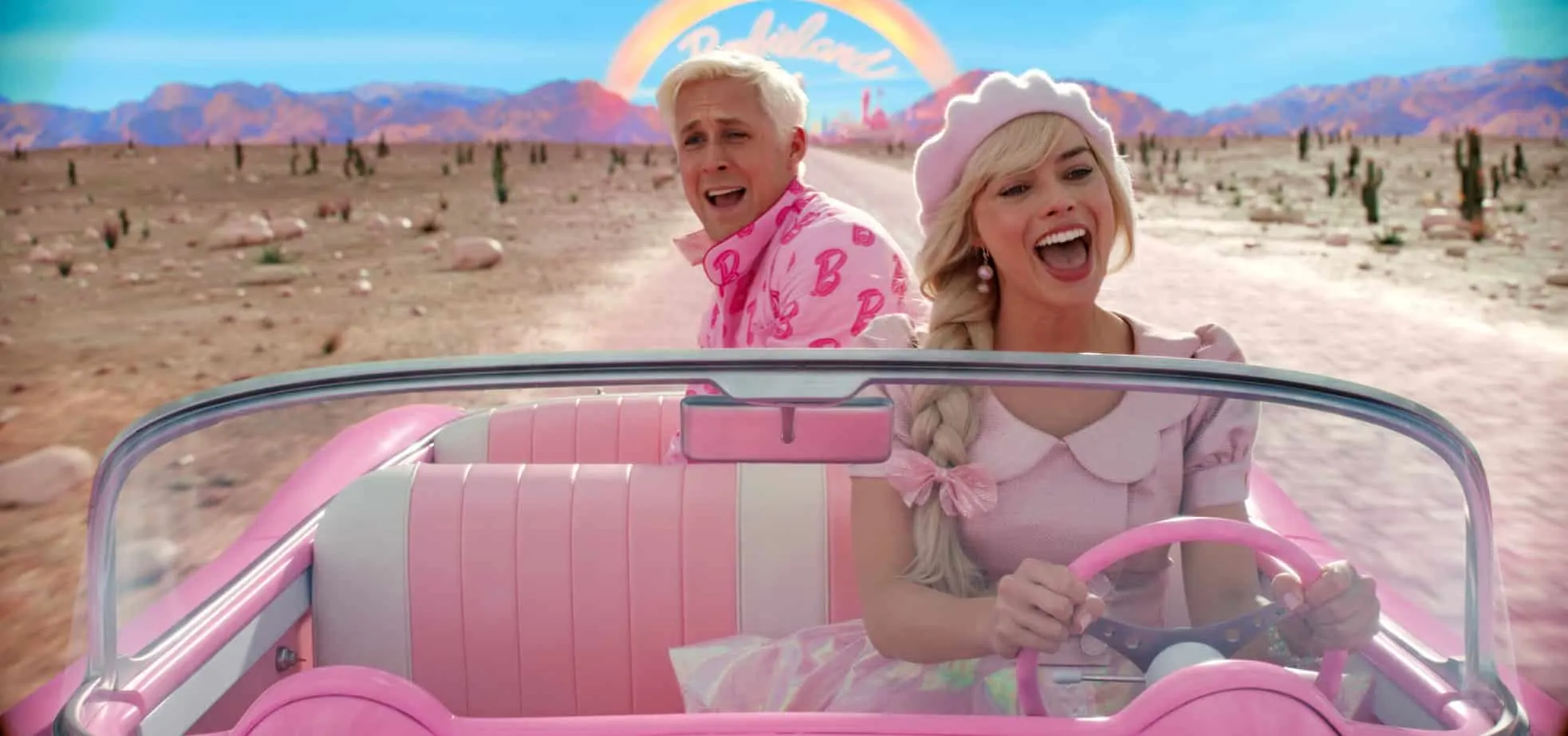 barbie and ken in a car with a rainbow behind them. quotes from barbie movie (2023).